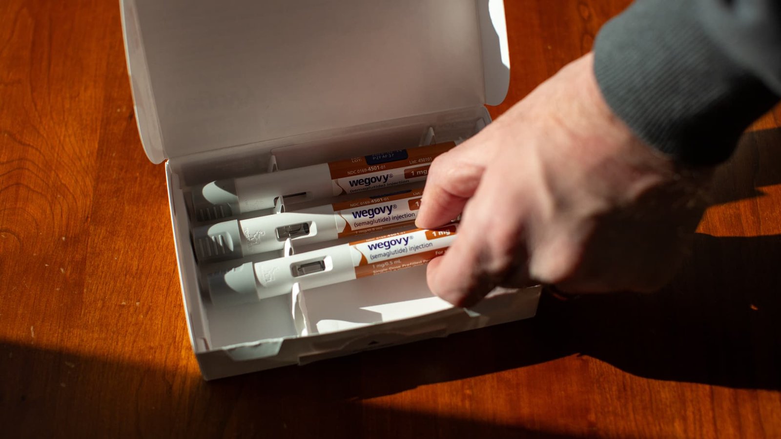 Stocks making the biggest moves midday: NVO, PLTR, AES, RKT