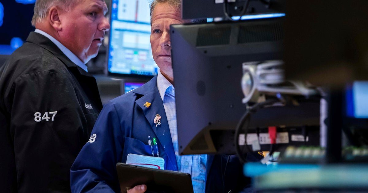 Dow slides nearly 800 points as AI and tariff risks rattle investors