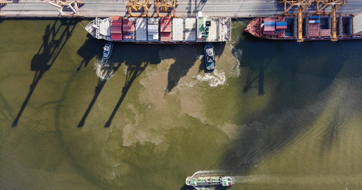 What will it take for ships to start sailing through the Strait of Hormuz again?